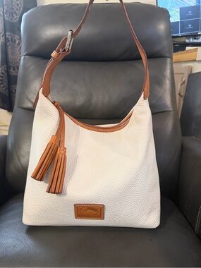Dooney & Bourke White and Tan Leather Tassel Shoulder Bag